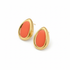 Angled view of coral-orange earrings