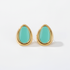 Front view of turquoise earrings on white background