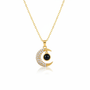 Gold crystal moon pendant necklace on white background
