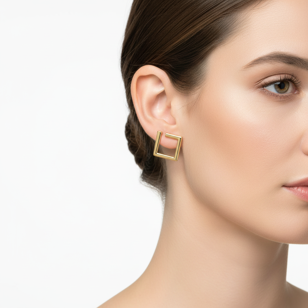 Gold geometric square studs on model