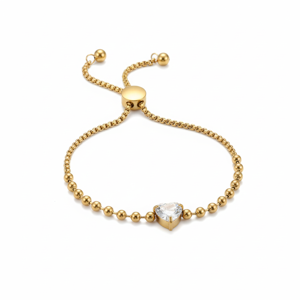 Gold heart crystal bracelet on white background