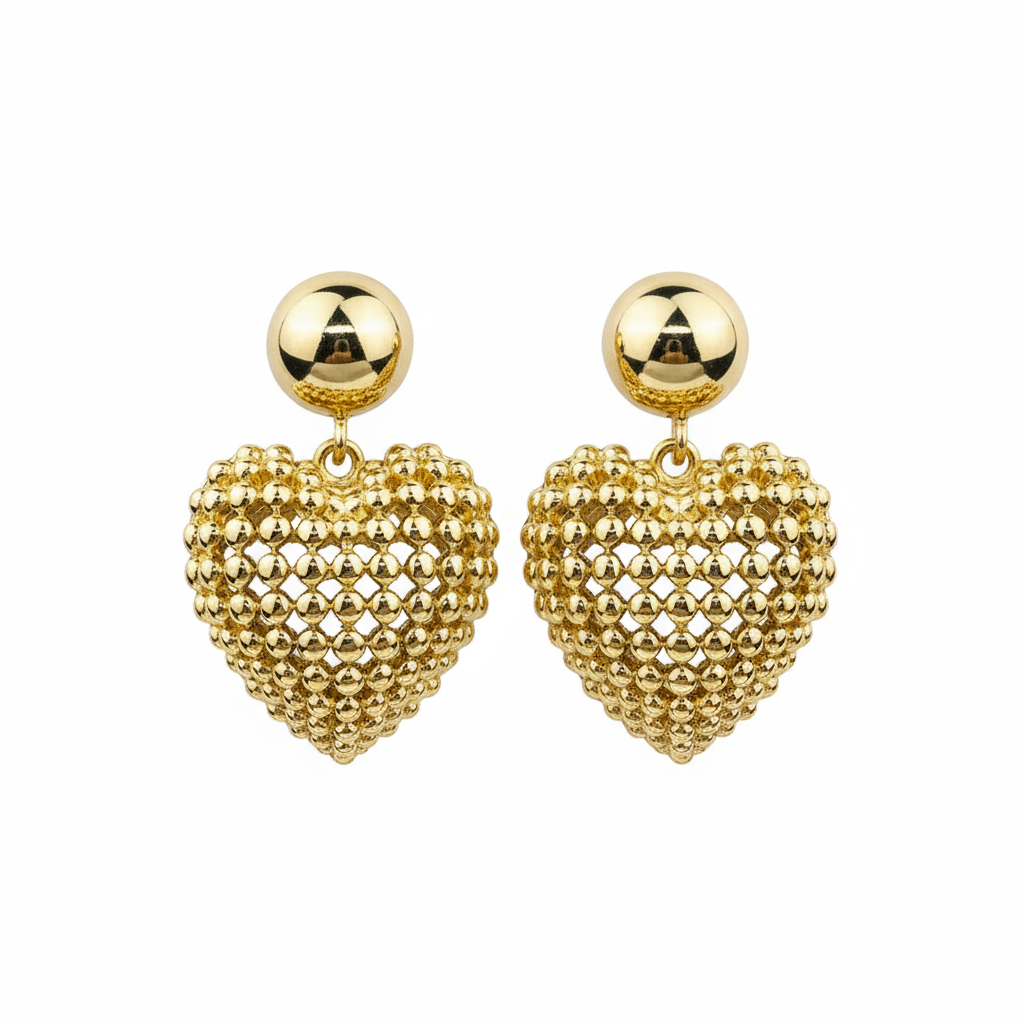 Gold heart earrings hanging