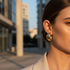 Gold hoop earrings outdoor model shot
