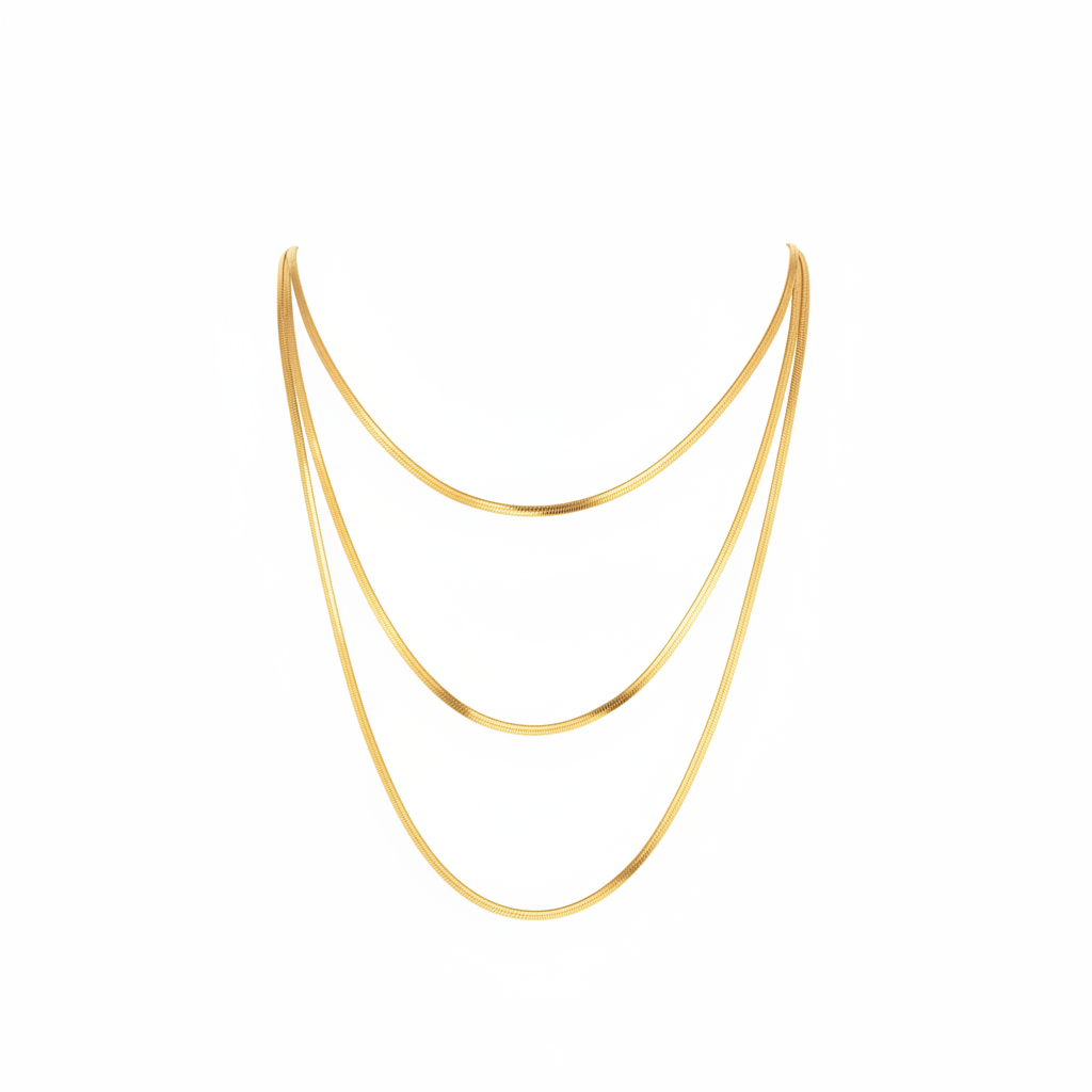 Gold layered chain necklace on white background