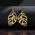 Gold leaf drop earrings dark showcase 1