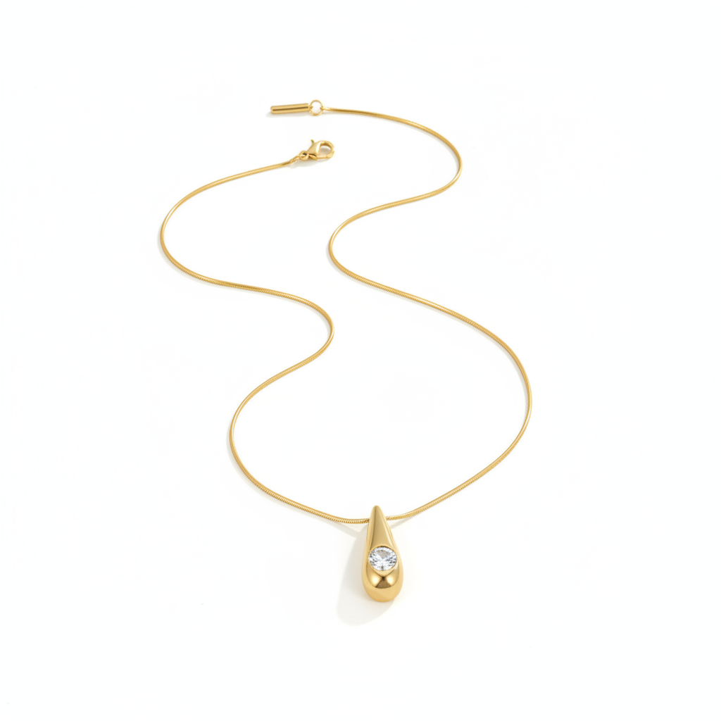 Gold necklace on white background