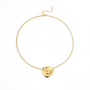 Gold rose spiral necklace on super white background