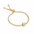 Gold round crystal bracelet on white background