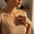 Indoor layered pearl necklaces