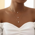 Model Wearing Gold Layered Necklace