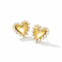 Pearl heart earrings on white background