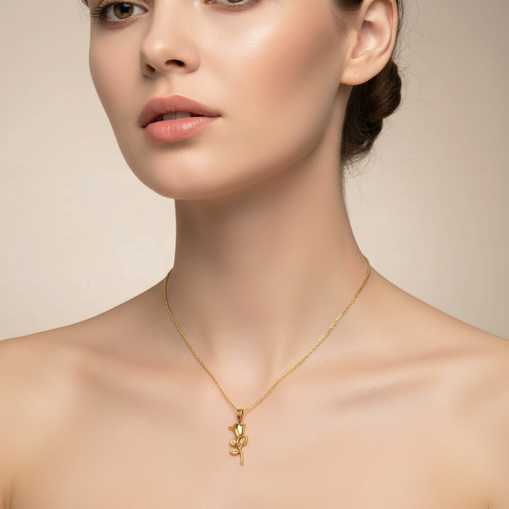 Square format model wearing gold rose necklace