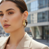 Textured gold hoops outdoor model shot
