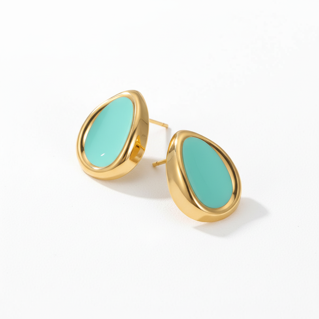 Three-quarter angle of turquoise earrings on white background