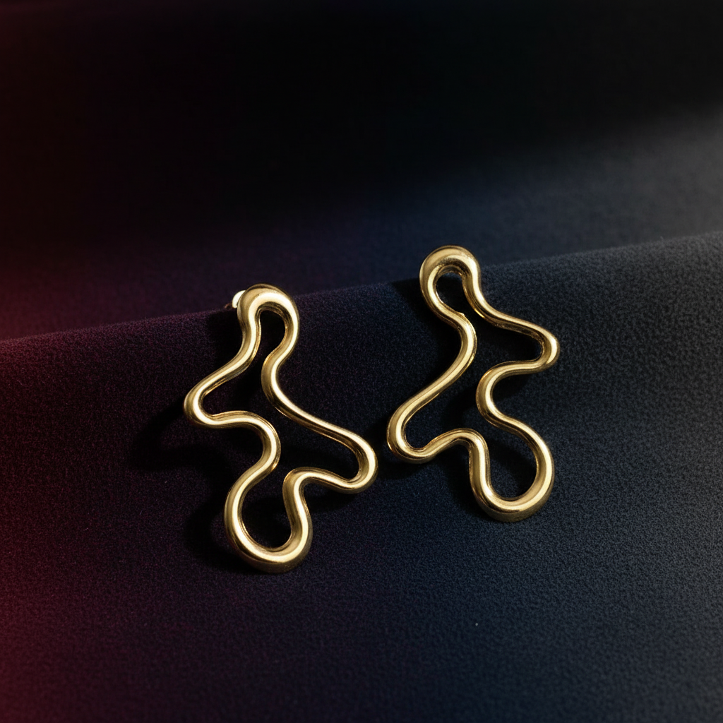 Wavy gold earrings dark showcase 1