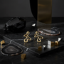 Wavy gold earrings dark showcase 2
